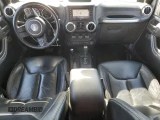 2013 Jeep Wrangler Unlimited Rubicon с VIN 1C4HJWFG3DL575477, выставлен на аукционе Copart как лот 63424765 с пробегом 133 085 миль миль и Чистый • Clean title. История ставок и продаж доступна на DreamBid. Изображение 8.