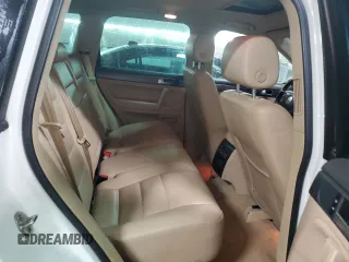2008 Volkswagen Touareg V6 с VIN WVGBE77L18D001404, выставлен на аукционе Copart как лот 51045355 с пробегом 120 082 миль миль и Списание • Salvage title. История ставок и продаж доступна на DreamBid. Изображение 10.