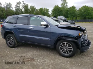2020 Jeep Grand Cherokee Limited with VIN 1C4RJFBG1LC385427, listed as a Copart auction lot 56102715 with 123,392 mi miles and Salvage title. Bid and sale history available at DreamBid. Image 4.