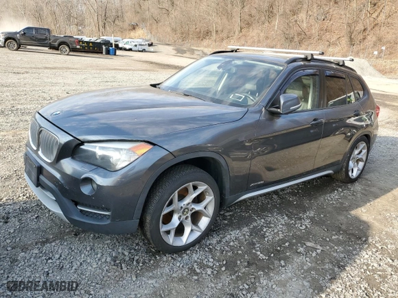 2013 BMW X1 xDrive28i with VIN WBAVL1C59DVR87374, listed as a Copart auction lot 49012675 with 217,709 mi miles and Clean Title. Bid and sale history available at carsss.com. Image 1.