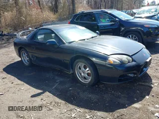 1999 Mitsubishi 3000GT GT z VIN JA3AM84JXXY001953, wystawiony jako IAAI lot #41834925 z przebiegiem 132 335 mil mil oraz . Historia ofert i sprzedaży dostępna na DreamBid. Obrazek 1.