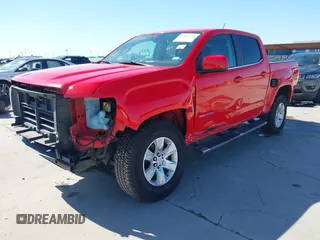 2016 GMC Canyon 2WD SLE z VIN 1GTG5CE34G1104127, wystawiony jako IAAI lot #41846079 z przebiegiem 106 123 mil mil oraz . Historia ofert i sprzedaży dostępna na DreamBid. Obrazek 2.