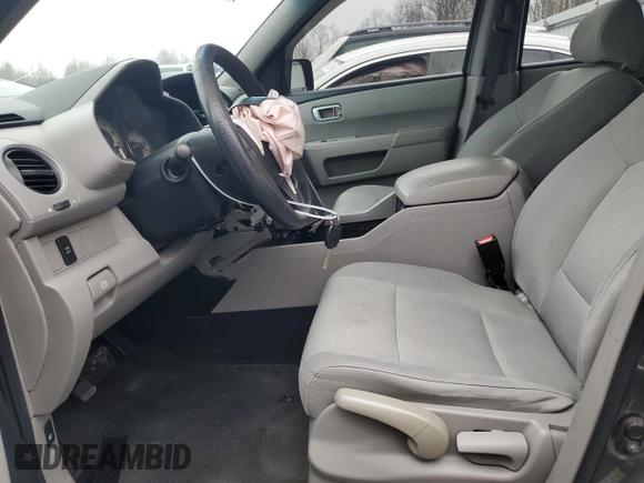 2011 Honda Pilot LX with VIN 5FNYF4H20BB068768, listed as a Copart auction lot 87152394 with 203,679 mi miles and Salvage Title. Bid and sale history available at DreamBid. Image 7.