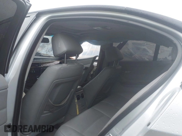 2007 BMW 3 Series 328xi with VIN WBAVC93597K034927, listed as a IAAI auction lot 42009274 with 184,427 mi miles and . Bid and sale history available at DreamBid. Image 8.