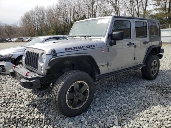 2015 Jeep Wrangler Unlimited Rubicon Hard Rock with VIN 1C4HJWFG4FL575054, listed as a Copart auction lot 51672655 with 130,405 mi miles and Clean title. Bid and sale history available at DreamBid. Image 1.