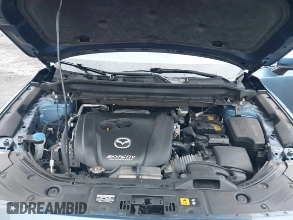2019 Mazda CX-5 Sport with VIN JM3KFBBM5K0668678, listed as a IAAI auction lot 41811146 with 102,634 mi miles and . Bid and sale history available at DreamBid. Image 10.