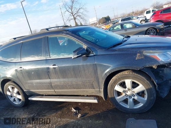 2016 Chevrolet Traverse LT with VIN 1GNKRGKD9GJ301823, listed as a IAAI auction lot 41374254 with 145,235 mi miles and . Bid and sale history available at DreamBid. Image 13.