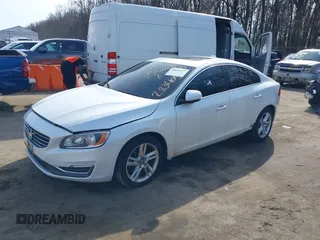 2014 Volvo S60 T5 z VIN YV1612FS0E2283405, wystawiony jako IAAI lot #38849477 z przebiegiem 108 473 mil mil oraz . Historia ofert i sprzedaży dostępna na DreamBid. Obrazek 2.