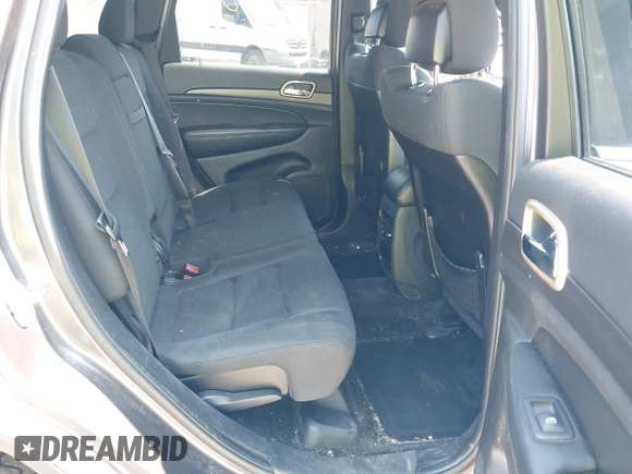 2015 Jeep Grand Cherokee Altitude with VIN 1C4RJFAG5FC710943, listed as a IAAI auction lot 42430708 with 163,776 mi miles and . Bid and sale history available at DreamBid. Image 8.
