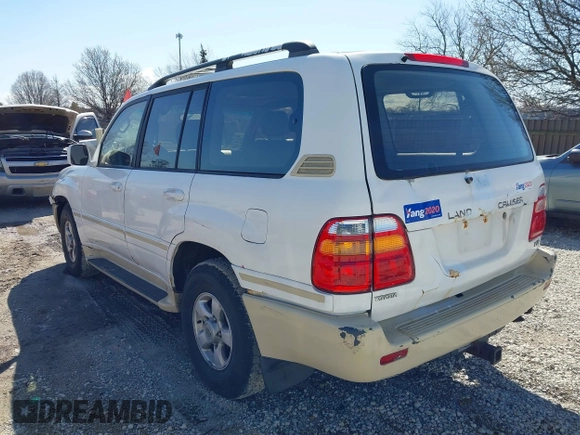 2000 Toyota Land Cruiser z VIN JT3HT05J5Y0126396, wystawiony jako IAAI lot #41986185 z przebiegiem 201 156 mil mil oraz . Historia ofert i sprzedaży dostępna na DreamBid. Obrazek 3.