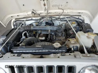 1999 Jeep Wrangler Sport с VIN 1J4FY19S9XP414239, выставлен на аукционе Copart как лот 66882505 с пробегом 131 916 миль миль и Чистый • Clean title. История ставок и продаж доступна на DreamBid. Изображение 11.