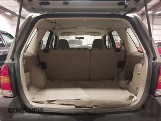 2005 Ford Escape XLS Value with VIN 1FMYU02Z35KA57707, listed as a IAAI auction lot 41759027 with 1 mi miles. Bid and sale history available at carsss.com. Image 16.