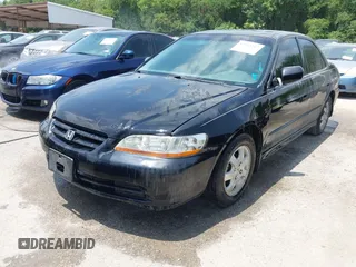 2002 Honda Accord EX z VIN 1HGCG56642A144814, wystawiony jako IAAI lot #42332217 z przebiegiem 250 835 mil mil oraz . Historia ofert i sprzedaży dostępna na DreamBid. Obrazek 2.