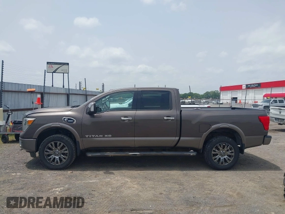 2016 Nissan Titan SL z VIN 1N6BA1F48GN510113, wystawiony jako IAAI lot #42252271 z przebiegiem 58 691 mil mil oraz . Historia ofert i sprzedaży dostępna na DreamBid. Obrazek 14.