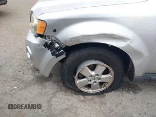 2012 Ford Escape XLT z VIN 1FMCU9DG4CKC57695, wystawiony jako IAAI lot #41716974 z przebiegiem 143 860 mil mil oraz . Historia ofert i sprzedaży dostępna na DreamBid. Obrazek 6.