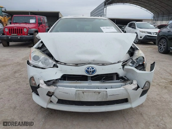 2014 Toyota Prius c One with VIN JTDKDTB31E1559712, listed as a IAAI auction lot 41286514 with 173,321 mi miles. Bid and sale history available at carsss.com. Image 12.