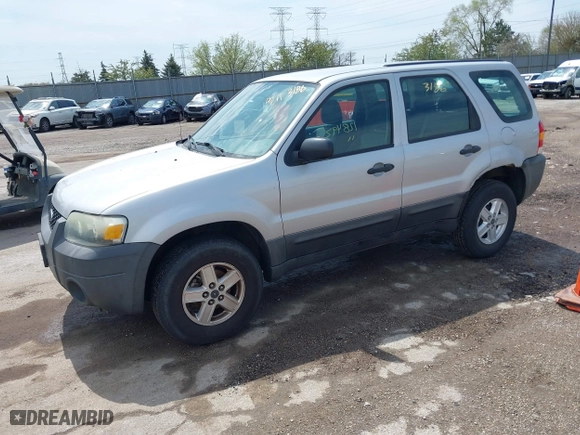 2007 Ford Escape XLS with VIN 1FMYU02Z97KB80446, listed as a IAAI auction lot 42113186 with 128,492 mi miles. Bid and sale history available at carsss.com. Image 2.
