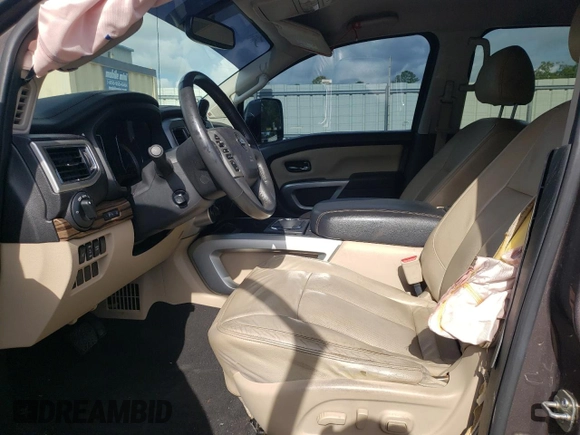 2017 Nissan Titan XD SL with VIN 1N6BA1F44HN510174, listed as a Copart auction lot 63245694 with 121,868 mi miles and Salvage Title. Bid and sale history available at carsss.com. Image 7.