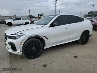 2022 BMW X6 M50i with VIN 5UXCY8C0XN9M57786, listed as a Copart auction lot 54755315 with 61,065 mi miles and Clean Title. Bid and sale history available at carsss.com. Image 1.