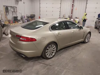 2009 Jaguar XF Premium Luxury with VIN SAJWA06B69HR04791, listed as a IAAI auction lot 41859289 with 97,647 mi miles. Bid and sale history available at carsss.com. Image 4.