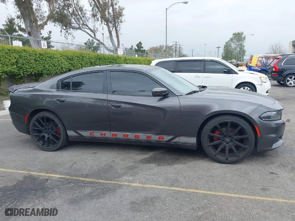 2019 Dodge Charger SXT with VIN 2C3CDXBG2KH643442, listed as a IAAI auction lot 41896681 with 104,061 mi miles. Bid and sale history available at carsss.com. Image 13.