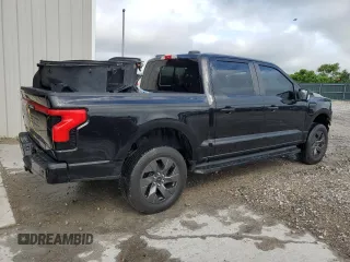 2022 Ford F-150 Lightning Pro with VIN 1FTVW1EL7NWG00726, listed as a Copart auction lot 57283755 with 55,672 mi miles and Salvage title. Bid and sale history available at DreamBid. Image 3.