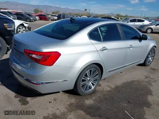 2016 Kia Cadenza Premium with VIN KNALN4D70G5211111, listed as a IAAI auction lot 41197070 with NaN miles. Bid and sale history available at carsss.com. Image 4.
