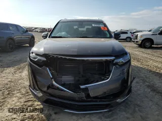2021 Cadillac XT6 Premium Luxury z VIN 1GYKPCRS6MZ205831, wystawiony jako Copart lot #47259215 z przebiegiem 31 959 mil mil oraz Szkody całkowita. Historia ofert i sprzedaży dostępna na DreamBid. Obrazek 5.