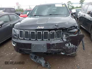 2019 Jeep Grand Cherokee Limited with VIN 1C4RJFBG1KC772977, listed as a IAAI auction lot 42242969 with 96,902 mi miles and . Bid and sale history available at DreamBid. Image 13.