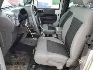 2009 Jeep Wrangler X with VIN 1J4FA24199L787574, listed as a Copart auction lot 58189835 with 74,331 mi miles and Salvage title. Bid and sale history available at DreamBid. Image 7.