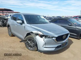 2020 Mazda CX-5 Touring with VIN JM3KFACM0L0772635, listed as a IAAI auction lot 41635115 with 120,285 mi miles. Bid and sale history available at carsss.com. Image 1.