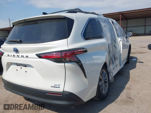 2021 Toyota Sienna XLE with VIN 5TDYRKEC6MS055675, listed as a IAAI auction lot 42044563 with 7,470 mi miles and . Bid and sale history available at DreamBid. Image 4.