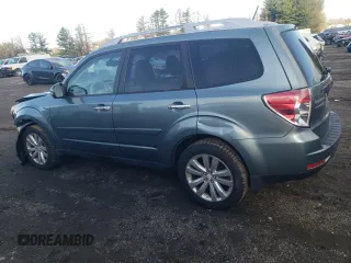 2011 Subaru Forester 2.5X Touring with VIN JF2SHAGCXBH752902, listed as a Copart auction lot 52102625 with 151,799 mi miles and Salvage Title. Bid and sale history available at carsss.com. Image 2.