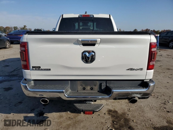 2019 Ram 1500 Laramie with VIN 1C6SRFDTXKN674871, listed as a Copart auction lot 77143314 with 30,418 mi miles and Salvage Title. Bid and sale history available at carsss.com. Image 6.