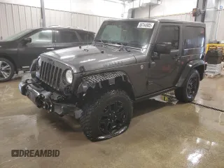 2017 Jeep Wrangler Willys Wheeler with VIN 1C4AJWAG9HL696710, listed as a Copart auction lot 88744905 with 66,800 mi miles and Salvage Title. Bid and sale history available at DreamBid. Image 1.