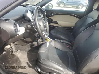 2012 MINI Coupe S z VIN WMWSX3C58CT465767, wystawiony jako Copart lot #88276985 z przebiegiem 113 023 mil mil oraz Szkoda całkowita • Salvage title. Historia ofert i sprzedaży dostępna na DreamBid. Obrazek 7.