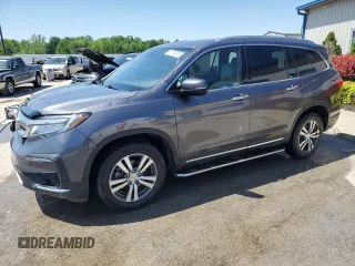 2021 Honda Pilot Touring 7-Passenger with VIN 5FNYF6H69MB055342, listed as a Copart auction lot 57592935 with 115,517 mi miles and Salvage title. Bid and sale history available at DreamBid. Image 1.
