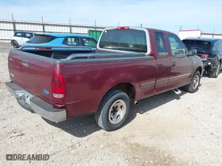 1997 Ford F-150 Standard with VIN 1FTDX1769VND19100, listed as a IAAI auction lot 41793295 with 161,721 mi miles. Bid and sale history available at carsss.com. Image 4.