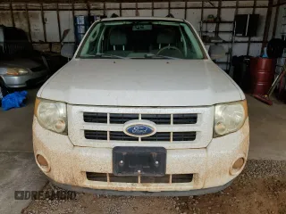 2010 Ford Escape Hybrid z VIN 1FMCU4K32AKA08232, wystawiony jako Copart lot #55356045 z przebiegiem 118 496 mil mil oraz Szkoda całkowita • Salvage title. Historia ofert i sprzedaży dostępna na DreamBid. Obrazek 5.