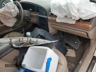 1998 Lincoln Continental with VIN 1LNFM97V5WY720999, listed as a Copart auction lot 84705054 with 0 mi miles and Salvage Title. Bid and sale history available at carsss.com. Image 8.