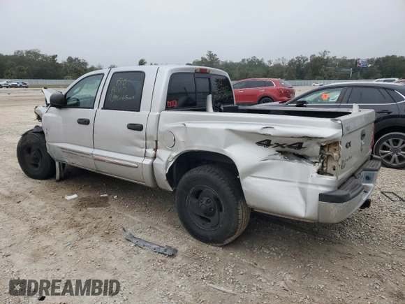 2005 Dodge Dakota Laramie with VIN 1D7HW58N75S100449, listed as a Copart auction lot 86336834 with Not Provided miles and Salvage Title. Bid and sale history available at DreamBid. Image 2.