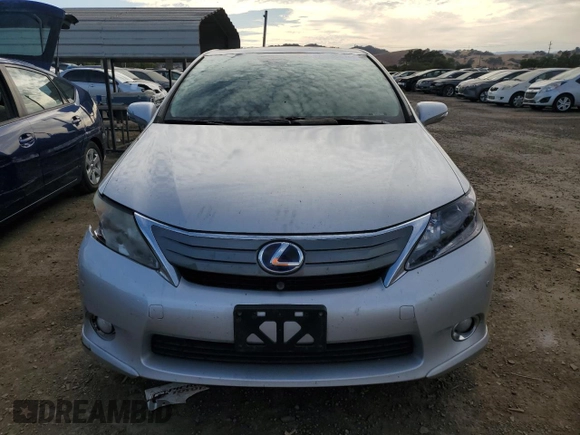 2010 Lexus HS 250h with VIN JTHBB1BA6A2031577, listed as a Copart auction lot 70838814 with 195,160 mi miles and Salvage Title. Bid and sale history available at DreamBid. Image 5.