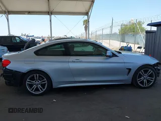 2014 BMW 4 Series 428i with VIN WBA3N7C58EF719514, listed as a IAAI auction lot 42310537 with 82,573 mi miles and . Bid and sale history available at DreamBid. Image 14.