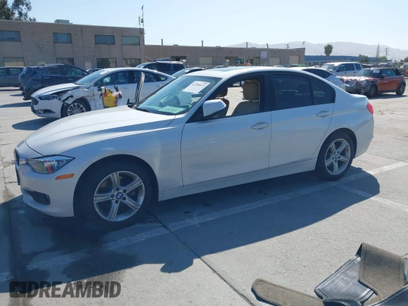 2014 BMW 3 Series 320i with VIN WBA3B1G50ENN90657, listed as a IAAI auction lot 42304612 with 129,377 mi miles and . Bid and sale history available at DreamBid. Image 19.
