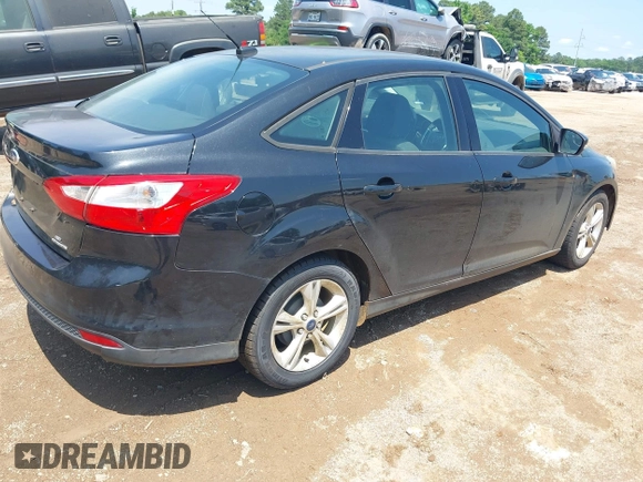 2014 Ford Focus SE with VIN 1FADP3F24EL431332, listed as a IAAI auction lot 42135538 with 121,362 mi miles. Bid and sale history available at carsss.com. Image 4.