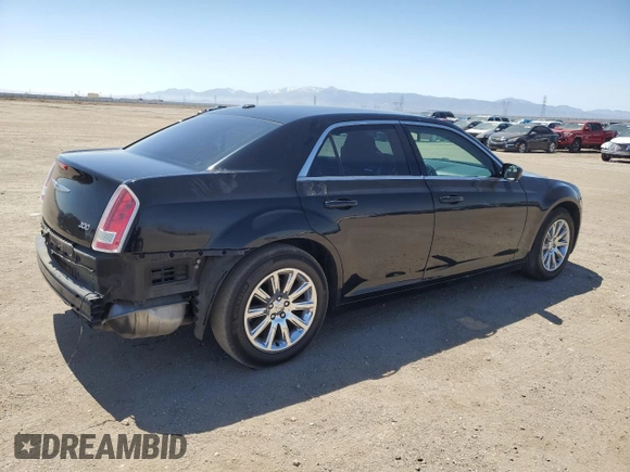 2014 Chrysler 300 with VIN 2C3CCAAG8EH307087, listed as a Copart auction lot 54091345 with 217,869 mi miles and Salvage Title. Bid and sale history available at DreamBid. Image 3.