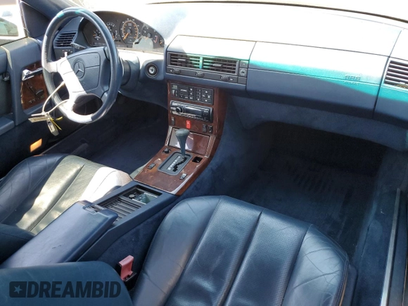 1992 Mercedes-Benz 500 z VIN WDBFA66E7NF049079, wystawiony jako Copart lot #52642285 z przebiegiem 69 976 mil mil oraz Szkody całkowita. Historia ofert i sprzedaży dostępna na DreamBid. Obrazek 8.
