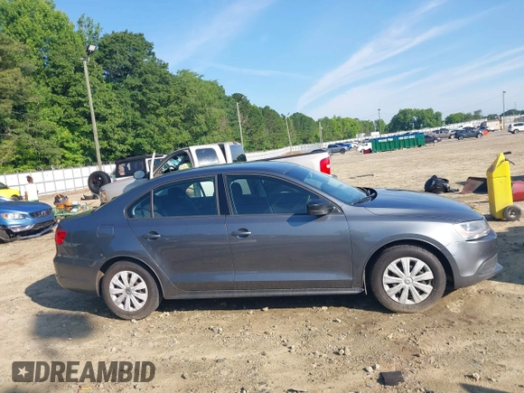 2014 Volkswagen Jetta S z VIN 3VW2K7AJ3EM303858, wystawiony jako IAAI lot #42449072 z przebiegiem 171 959 mil mil oraz . Historia ofert i sprzedaży dostępna na DreamBid. Obrazek 13.