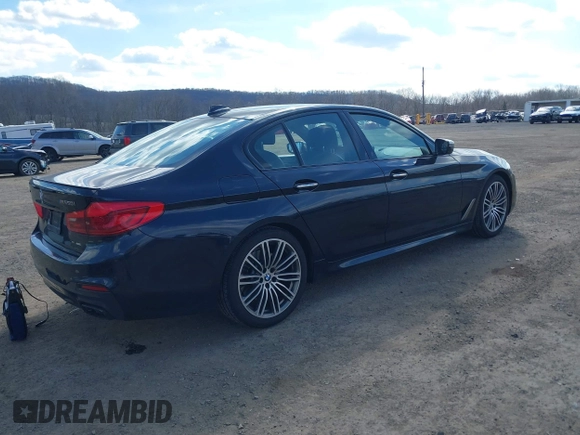 2018 BMW 5 Series M550i xDrive with VIN WBAJB9C52JB035930, listed as a IAAI auction lot 41674415 with 56,294 mi miles and . Bid and sale history available at DreamBid. Image 4.
