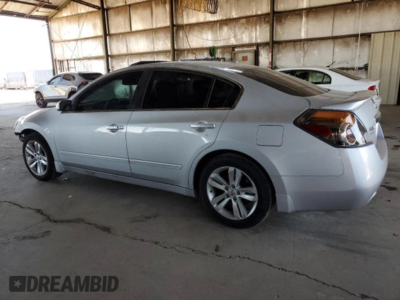 2011 Nissan Altima SR with VIN 1N4BL2AP7BN469086, listed as a Copart auction lot 60890695 with 147,438 mi miles and Salvage title. Bid and sale history available at DreamBid. Image 2.